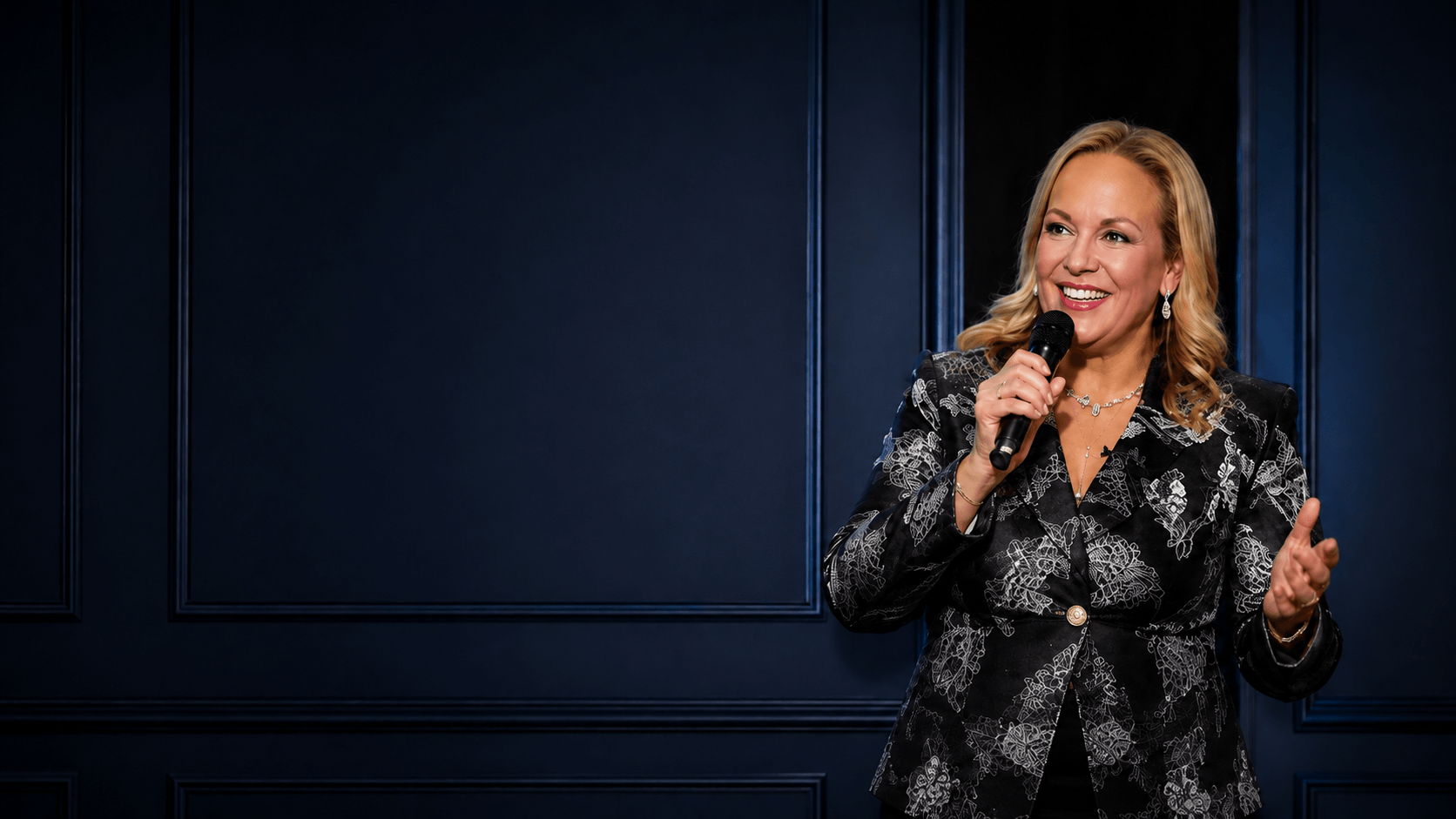 Vicki 'Giana' Greco speaking on stage